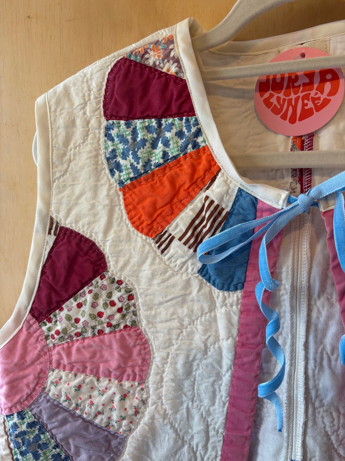 Vintage Flower Quilted Vest with Blue Bow