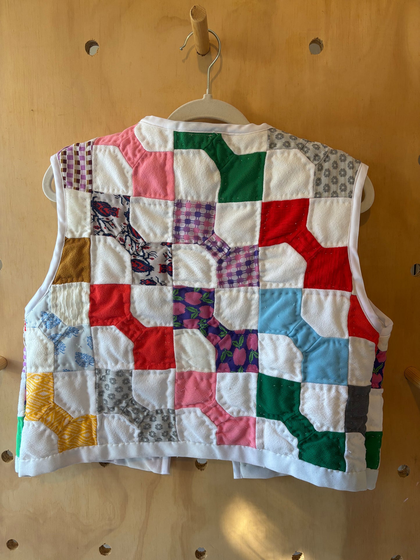 Rainbow Quilted Vest with Purple Bow